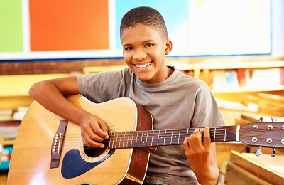 child playing guitar
